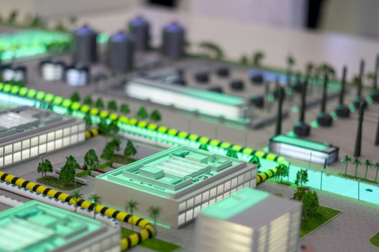 Miniature industrial complex with glowing lights